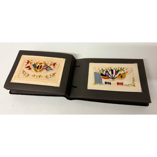 203 - Vintage postcard album containing World War I sweetheart embroidered silk postcards and vintage cat ... 