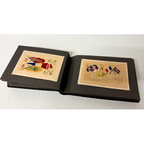 203 - Vintage postcard album containing World War I sweetheart embroidered silk postcards and vintage cat ... 