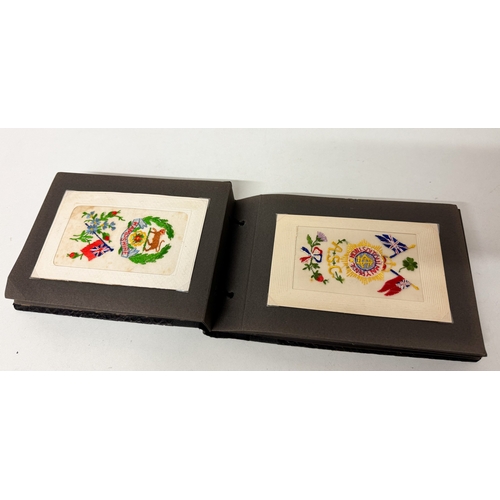 203 - Vintage postcard album containing World War I sweetheart embroidered silk postcards and vintage cat ... 
