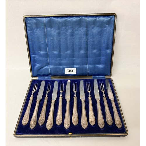 494 - A Victorian cased set of six pastry knives and forks with filled silver hallmarked handles in a fitt... 