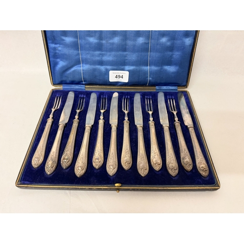 494 - A Victorian cased set of six pastry knives and forks with filled silver hallmarked handles in a fitt... 