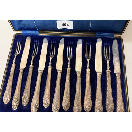 494 - A Victorian cased set of six pastry knives and forks with filled silver hallmarked handles in a fitt... 
