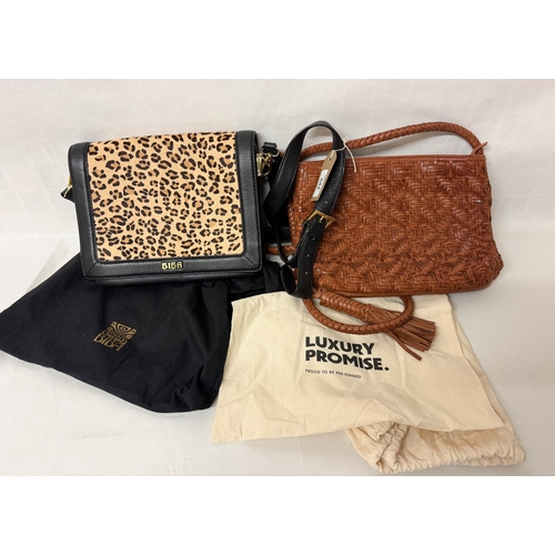 544 - Biba  - A tan leather plaited bag and a leopard skin effect handbag together with two Fossil handbag... 