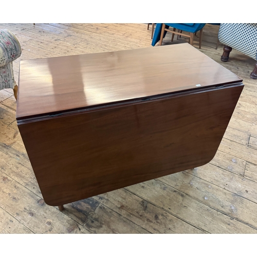 37 - An early Victorian mahogany drop leaf dining table on turned legs, 3'6