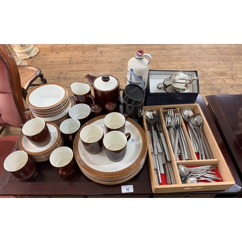 41 - Poole Pottery two tone dinner and tea set together with assorted stainless cutlery, a bottle of Bols... 