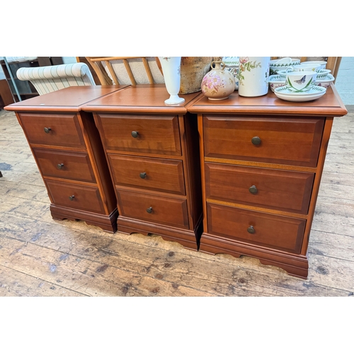 50 - Three matching modern three drawer mahogany bedside chests, each 19 1/2