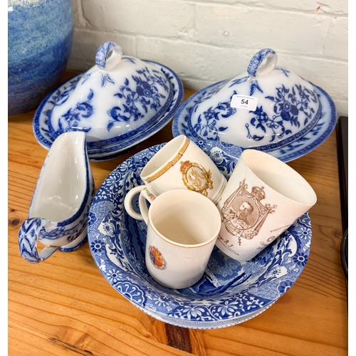 54 - A pair of blue and white china tureens together with a blue and white bowl and coronation mugs etc