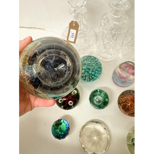 223 - Four cut glass decanters with stoppers together with a Jean- Claude Novaro hand blown Art Glass perf... 