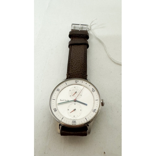 574 - A gent's Paul Smith chronograph quartz wrist watch on an original brown leather strap