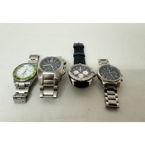 576 - A collection of four modern gent's dress watches of various styles