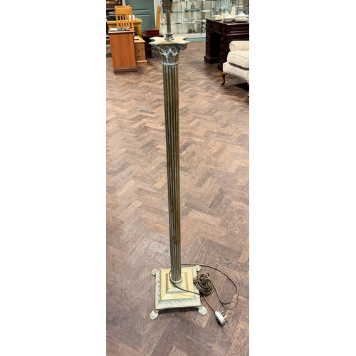 92 - A Corinthian column brass standard lamp with bobbled shade