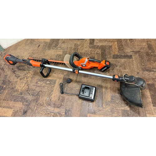609 - A Black and Decker cordless hedge trimmer and garden strimmer with battery and spare charger