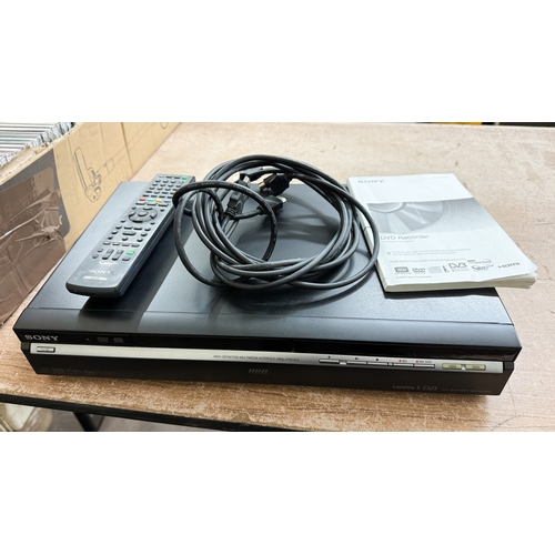 625 - A Sony DVD recorder with remote control and instruction books