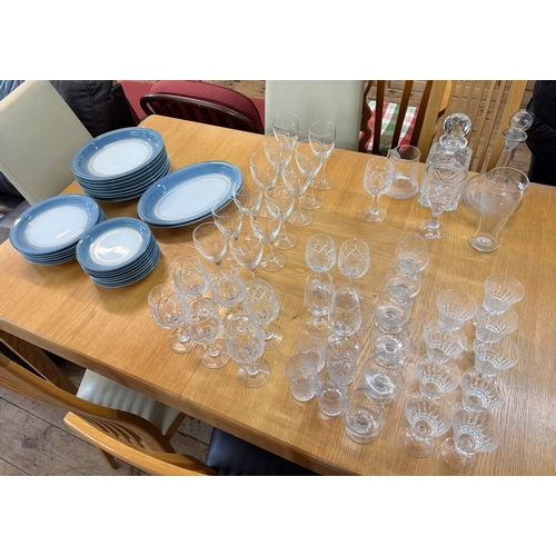 646 - A large quantity of cut glass ware to include decanters together with a quantity of Denby blue glaze... 