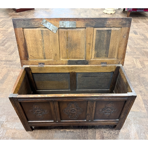 168 - A late Victorian oak three panel coffer with carved fronts, 3' wide