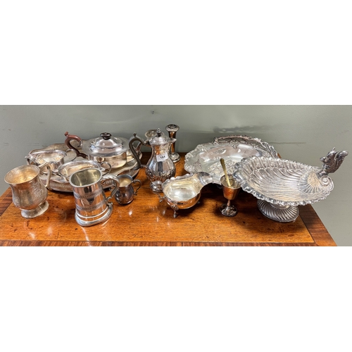 184 - A three piece plated tea set together with tankards, a coffee pot, dishes and other plated items