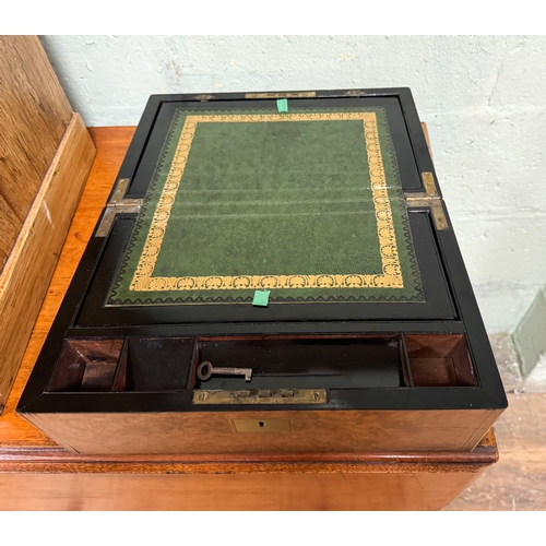 188 - A Victorian brass mounted burr walnut writing box