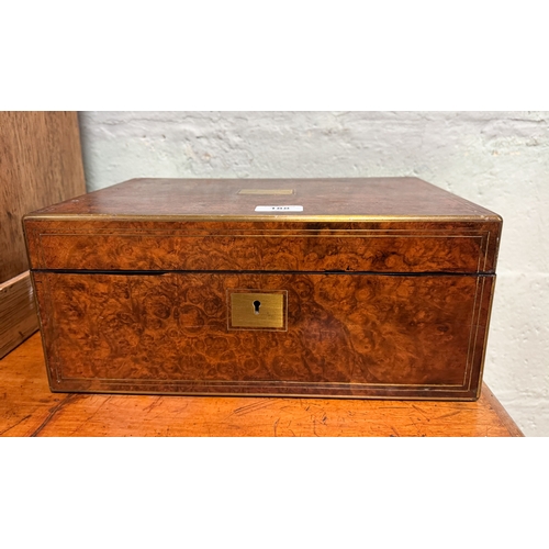 188 - A Victorian brass mounted burr walnut writing box