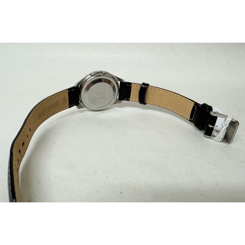 580 - Seiko 5 Sportsmatic automatic calendar wrist watch on black leather strap.