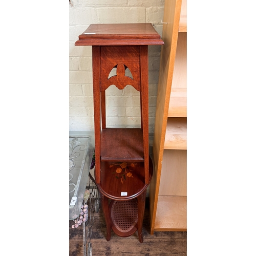 71 - An Italian inlaid oval two tier occasional table and an oak plant stand