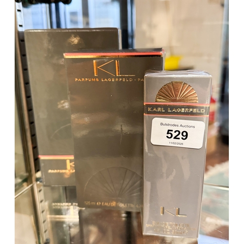 529 - Three bottles of Karl Lagerfeld perfume in boxes