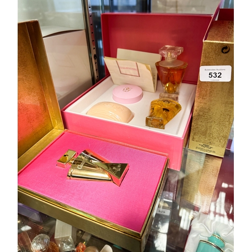 532 - Guerlain Champs Elysees bottle of perfume in a gift box and a cased gift set