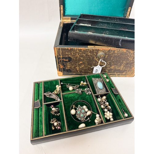 470 - A Victorian jewellery box containing silver and marcasite pieces, faux pearl earrings with two lift ... 