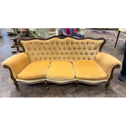 281 - A French style mahogany button backed three seater settee on cabriole style legs with loose seat cus... 