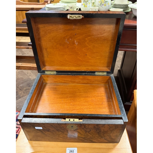 310 - A Victorian walnut travelling case with drop flap and concealed drawer opening to reveal a writing s... 