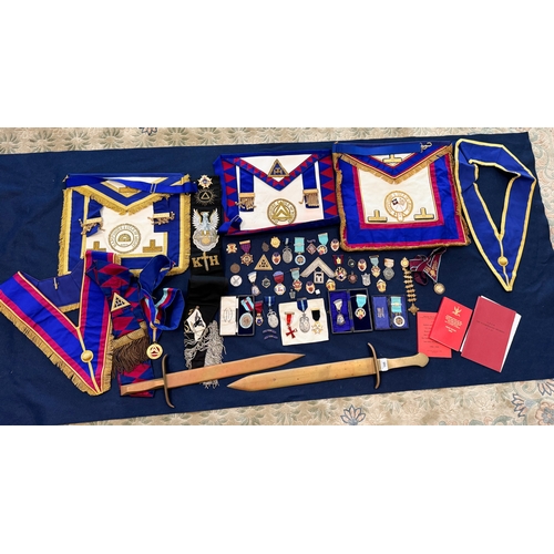 145 - A quantity of assorted masonic regalia to include jewels and swords etc