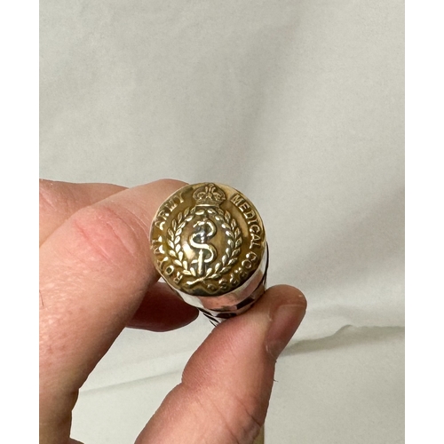 246 - A RAMC swagger stick with gilt metal finial