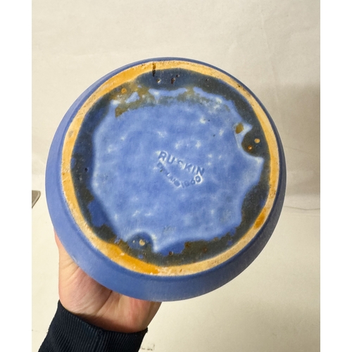 256 - A ceramic Ruskin blue coloured drip glazed vase