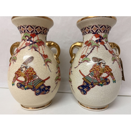 330 - A pair of Japanese twin handled Satsuma vases
