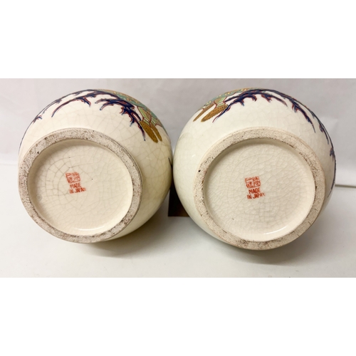 330 - A pair of Japanese twin handled Satsuma vases