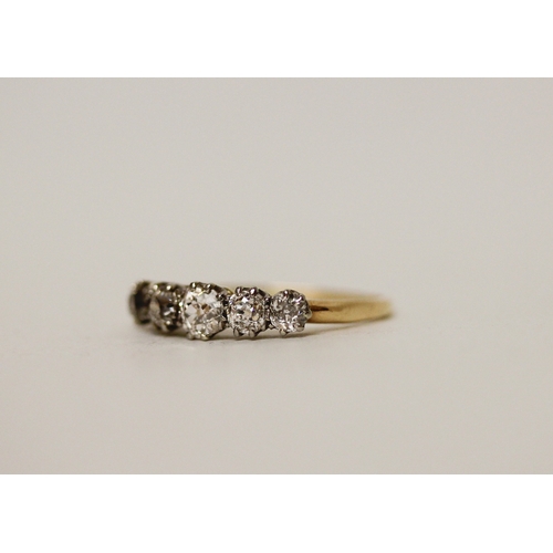 385 - An antique five stone diamond ring on unmarked gold band, presumed to be 18ct, ring size L/M, 1.7 gr... 