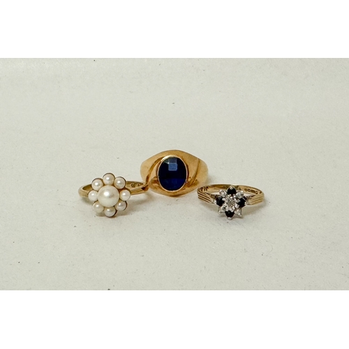 394 - Two 9ct gold dress rings and a French signet ring set with a blue stone, 7.4 grams