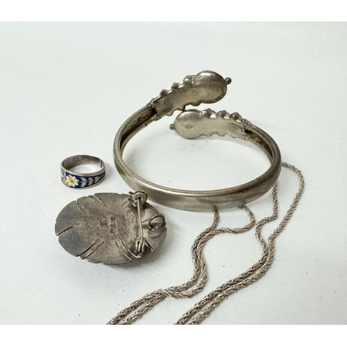 404 - A silver and opalite brooch together with a chain necklace, a Victorian bangle and an enamel ring et... 