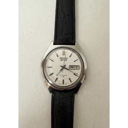 557 - A Seiko Actus automatic gent's calendar wrist watch on a later black leather strap, numbered 7019-80... 