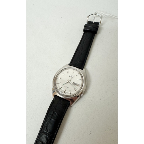 557 - A Seiko Actus automatic gent's calendar wrist watch on a later black leather strap, numbered 7019-80... 