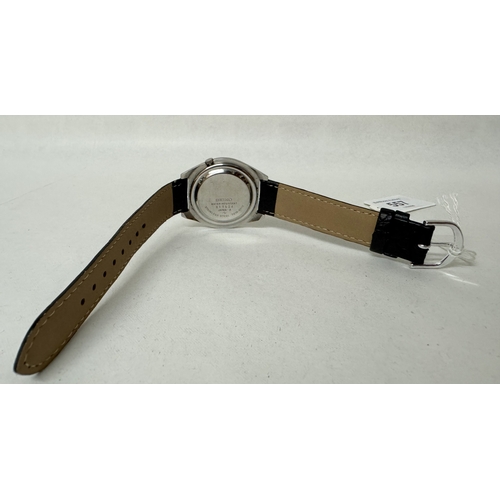 557 - A Seiko Actus automatic gent's calendar wrist watch on a later black leather strap, numbered 7019-80... 