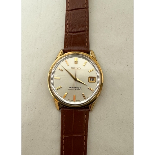 558 - A gent's Seiko Seikomatic - R automatic date wrist watch on a later brown leather strap
