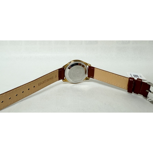 558 - A gent's Seiko Seikomatic - R automatic date wrist watch on a later brown leather strap