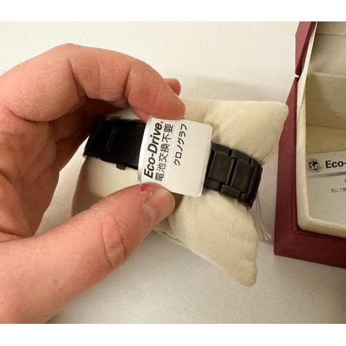 565 - A new gent's Citizen quartz date wrist watch on a black stainless steel strap with box and paperwork... 