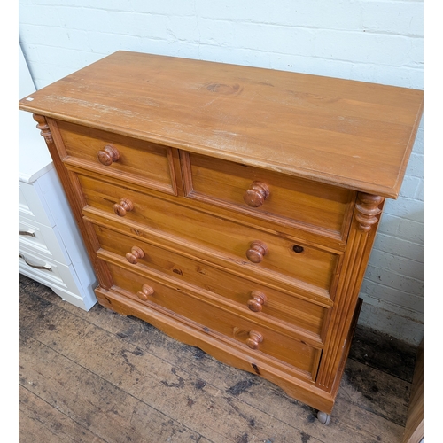 38 - A pine chest of three long and two short drawers with bun handles, 33