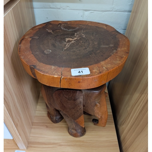 41 - A carved wood elephant plant stand...