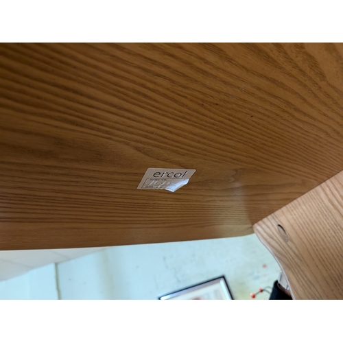 6 - A modern Ercol blond elm table top magazine rack...