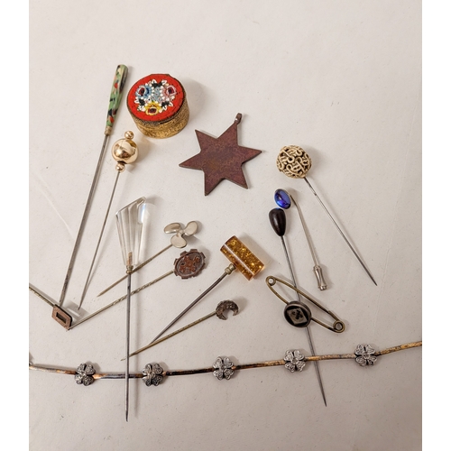115 - A silver and CZ set bracelet together with a 1939- 45 star medal and silver and other stick pins bro... 