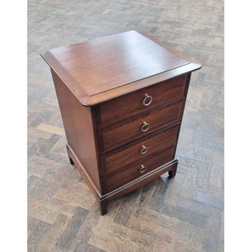 53 - A Stag Minstrel mahogany bedside chest fitted four drawers