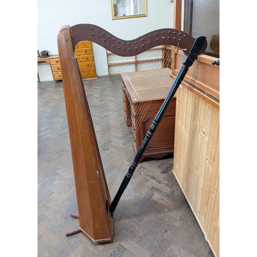 81 - A mahogany finished Venezuelan harp