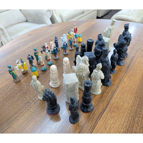 109 - Three various chessmen sets of varying shapes and sizes